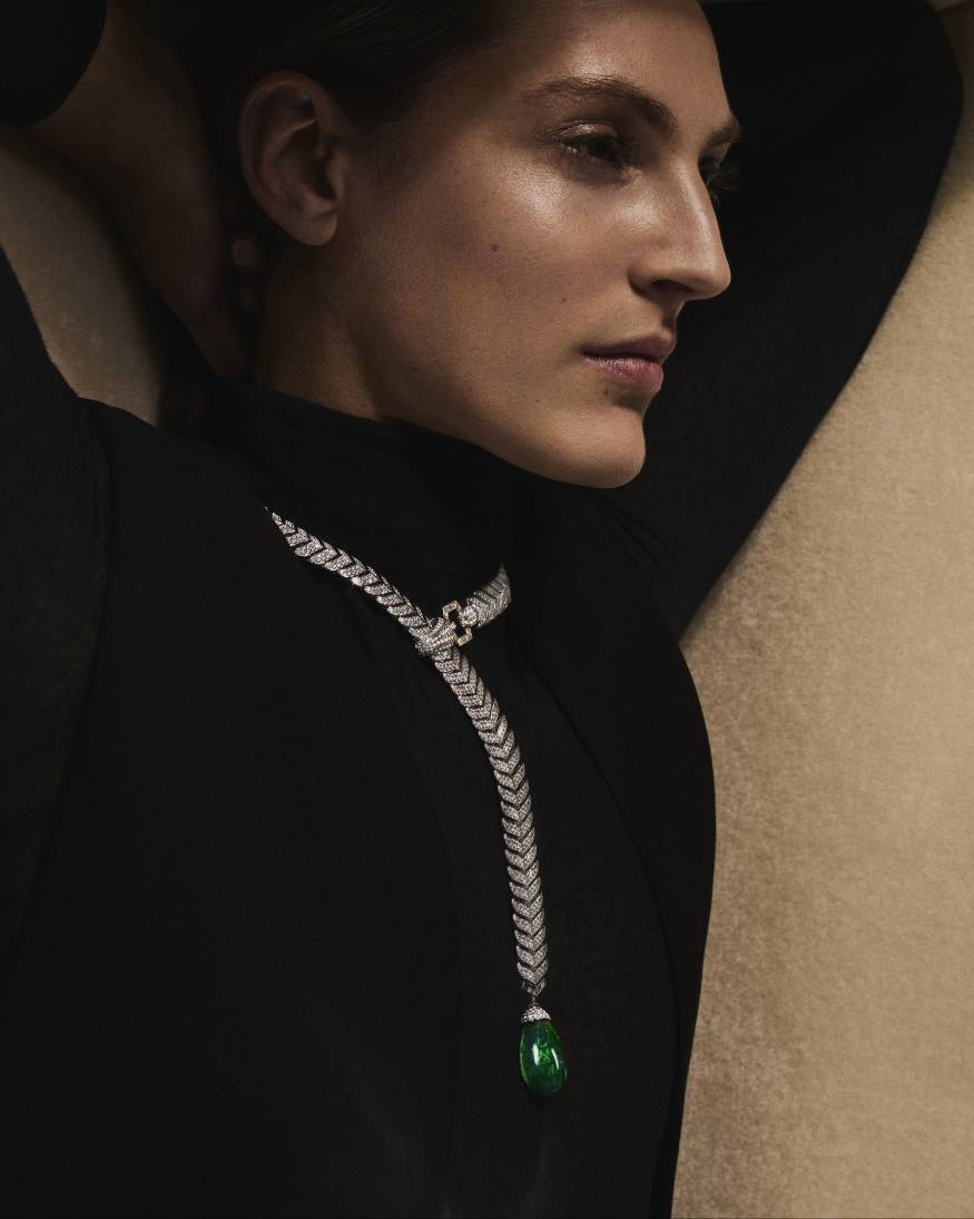 model wearing histoire de style art deco collection diamond & emerald necklace