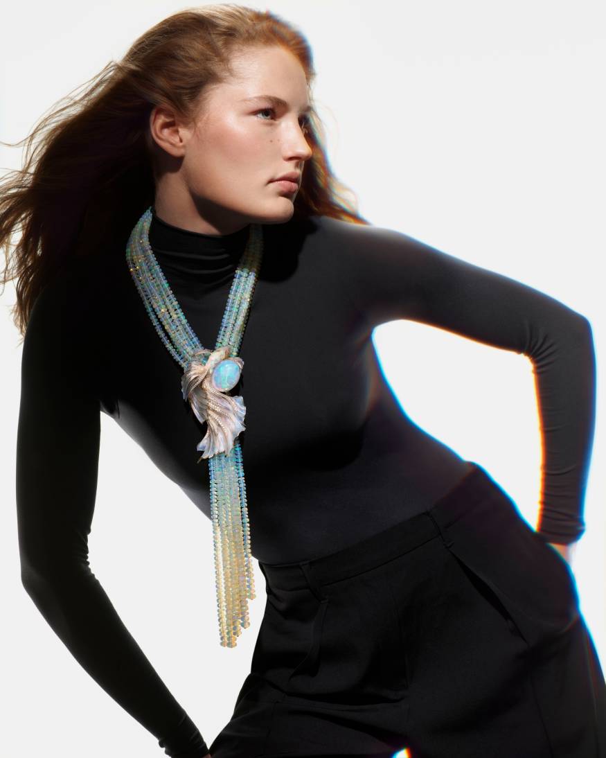 model wearing a fish necklace from the carte blanche holographic collection 